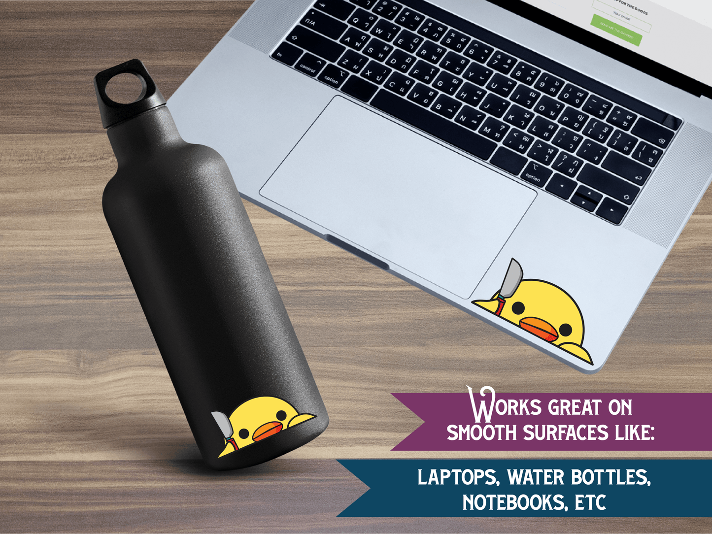 a laptop computer sitting on top of a wooden desk