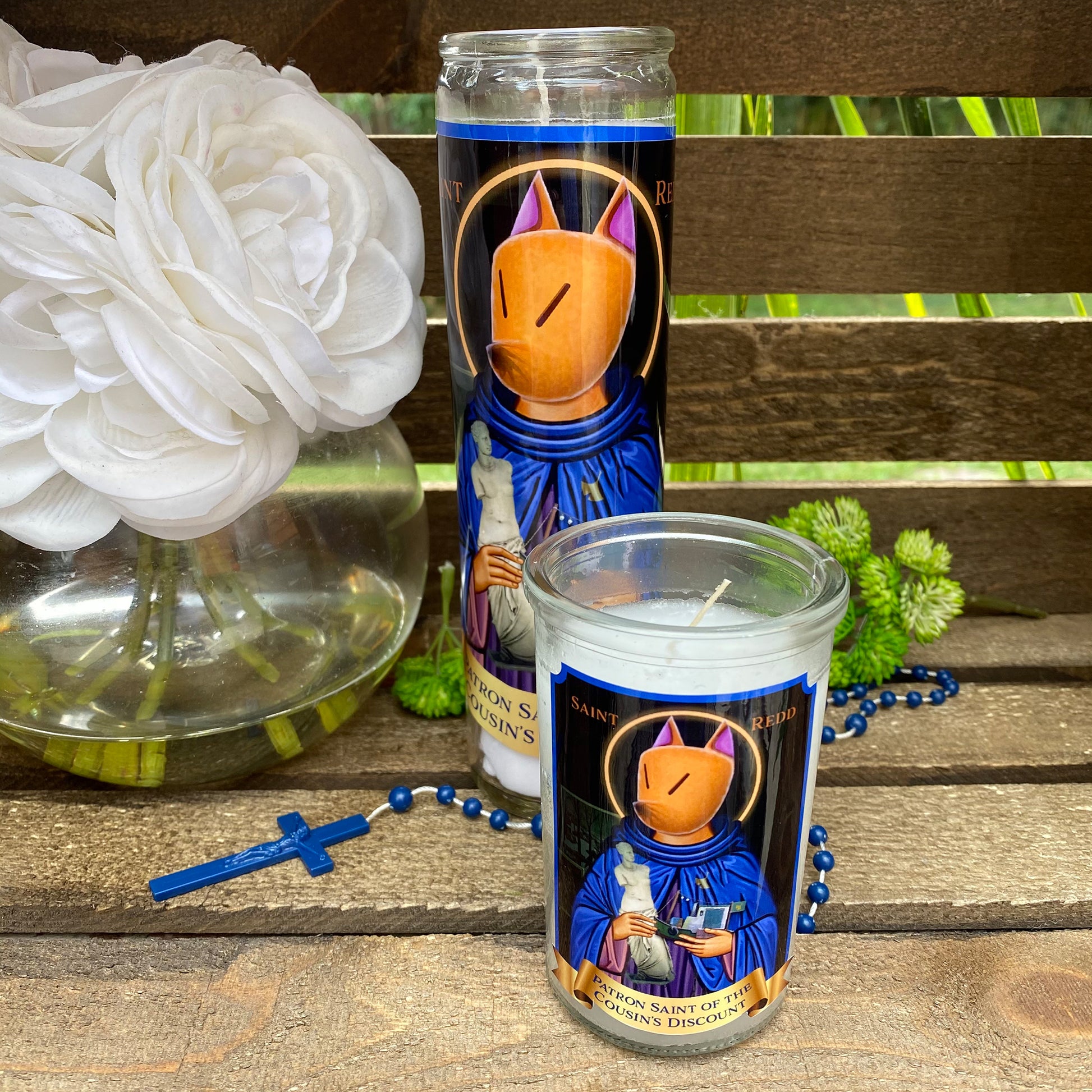 a candle with a picture of a cat on it