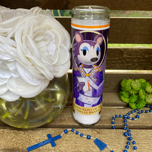 a glass vase with a flower and a candle on a table