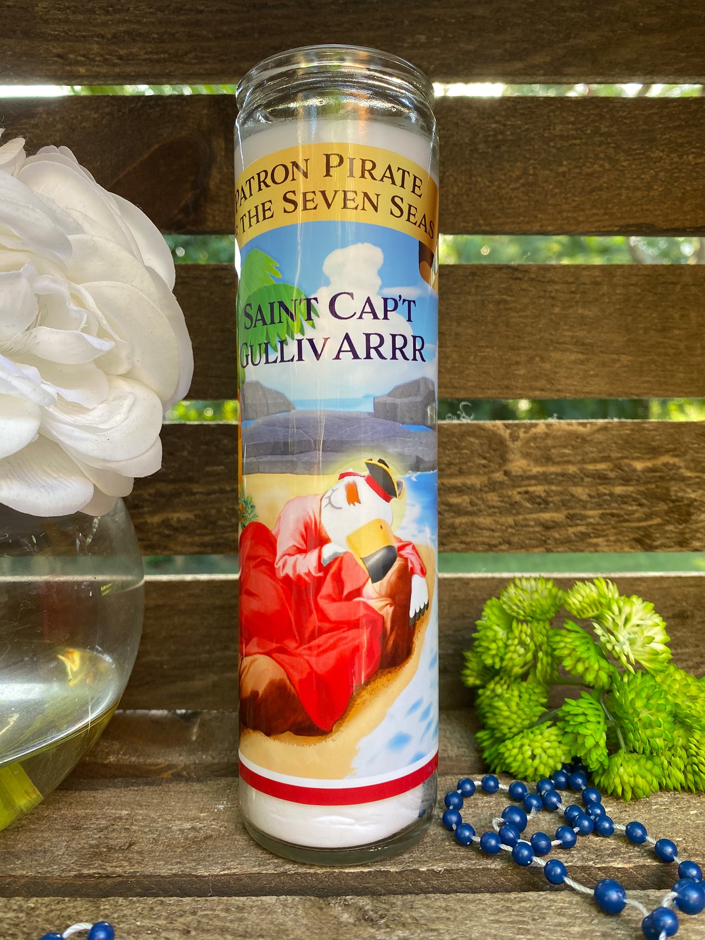 a candle with a picture of a man on it