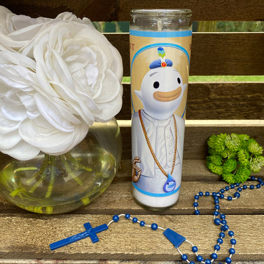 a white flower and a blue rosary on a wooden table