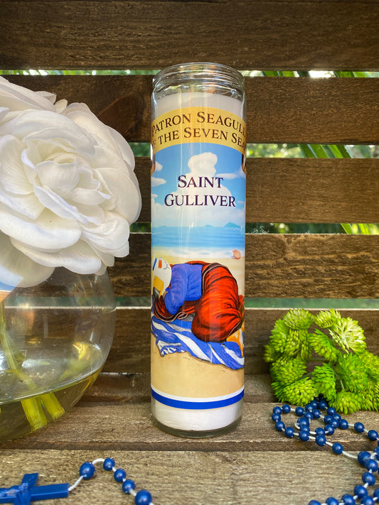 a bottle of saint gulliver next to a flower