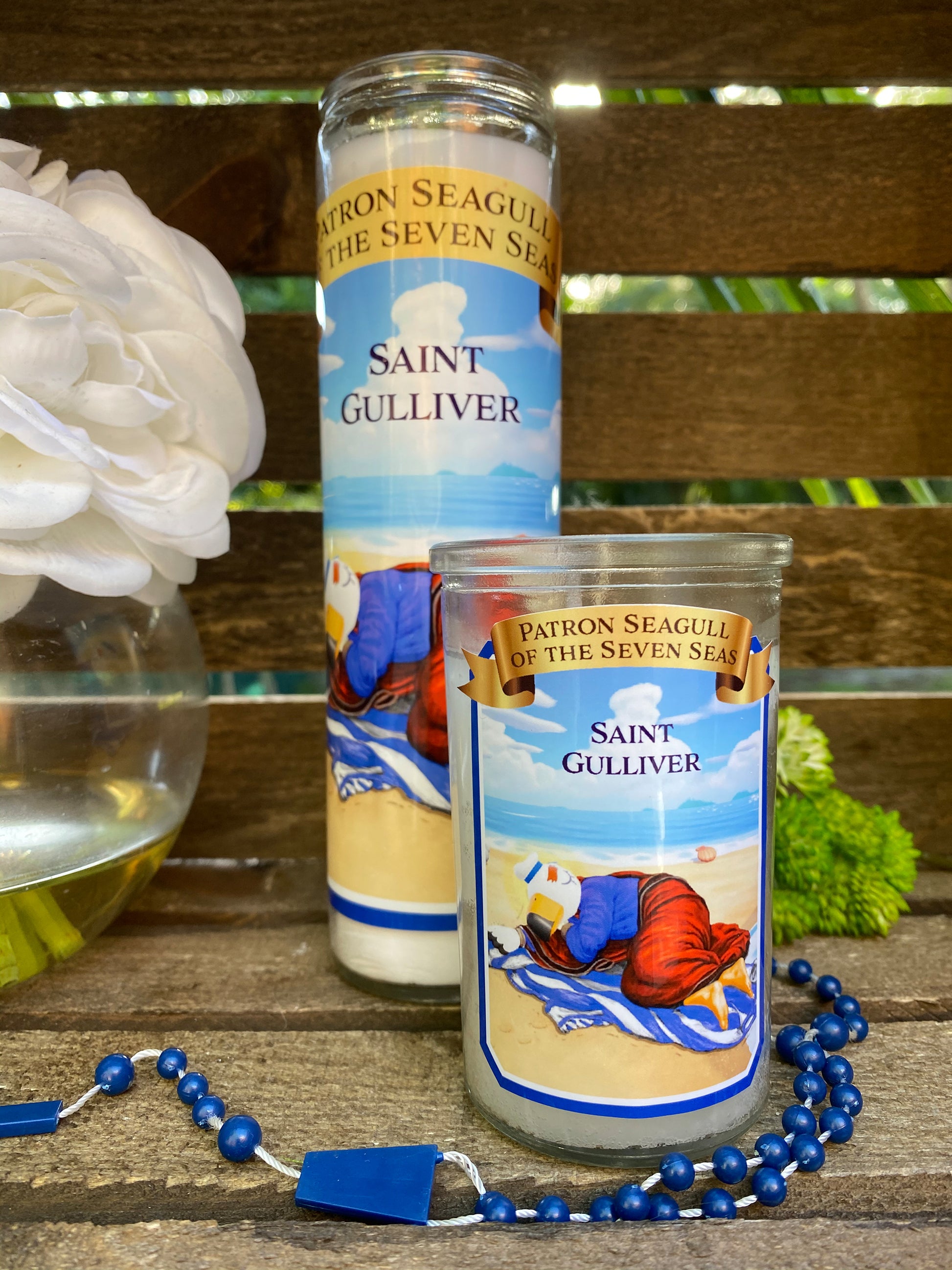 a bottle of saint gulliver next to a glass of wine