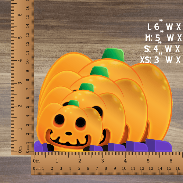 a ruler with a picture of a pumpkin on it