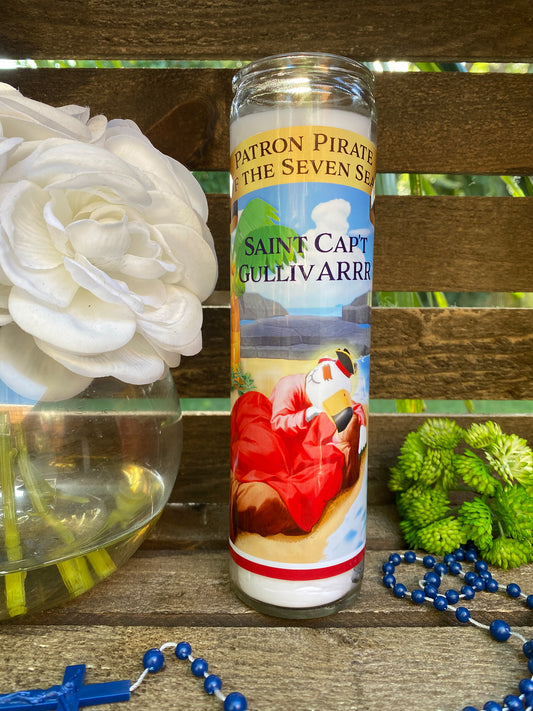 a bottle of saint camotilvarine next to a rosary and a flower
