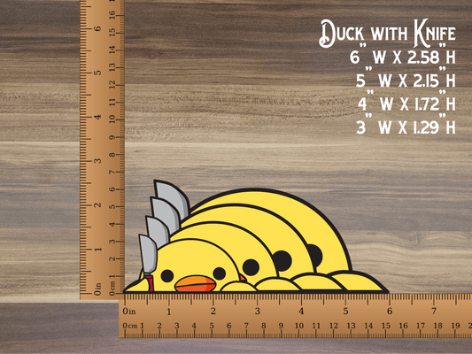 a ruler with a duck with knife on it