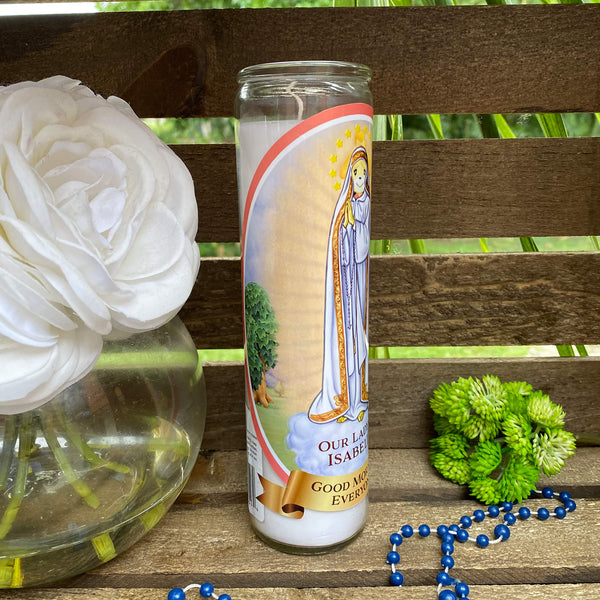 a white rose sitting next to a glass of water