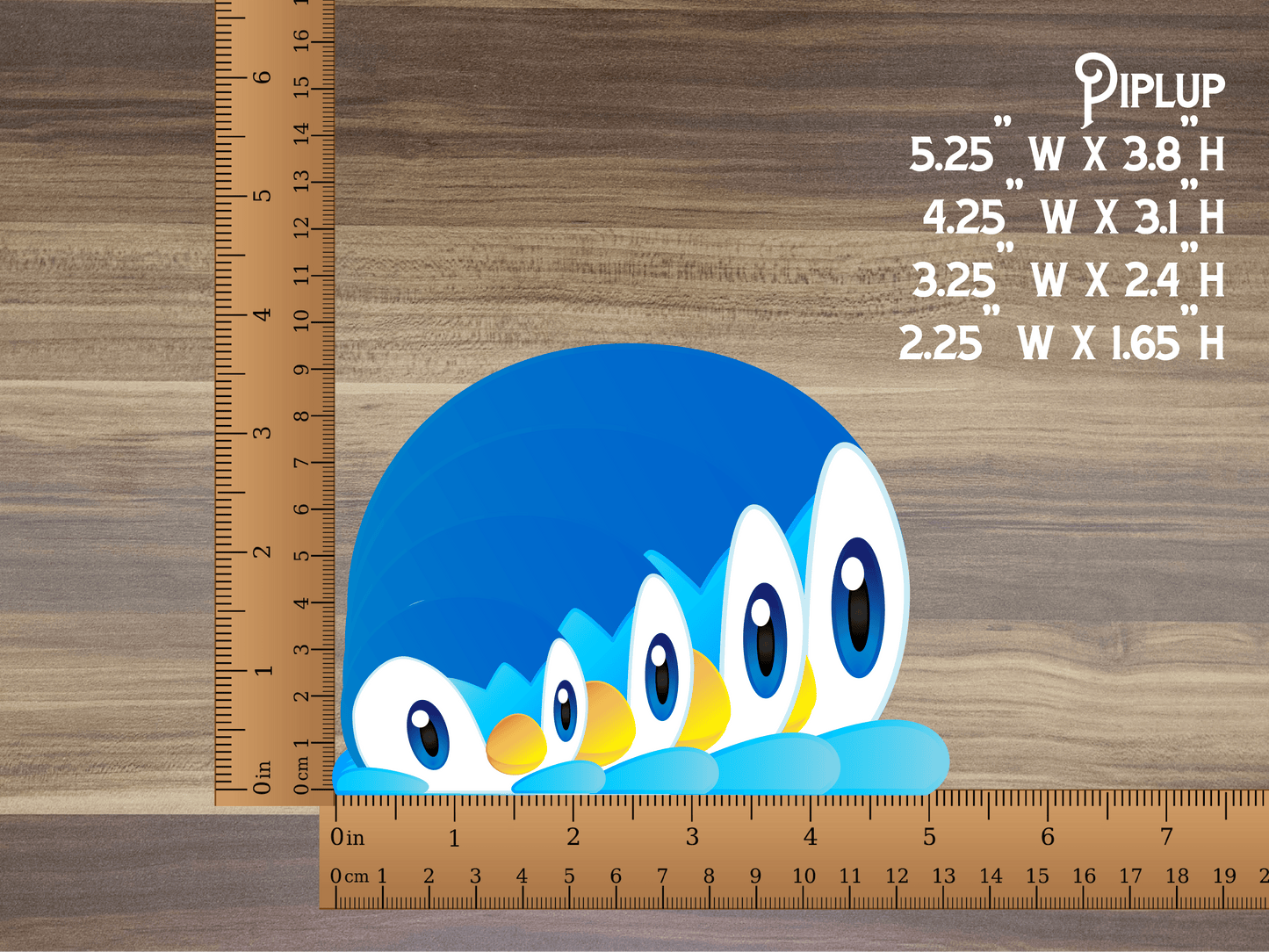 a picture of a blue bird on a ruler