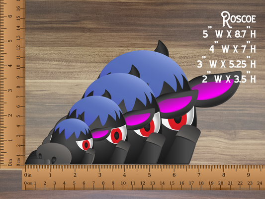 a wooden ruler with a picture of a black sheep with red eyes