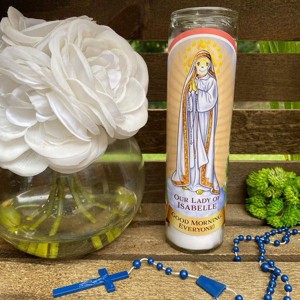 a rosary, a vase with flowers, and a candle on a table