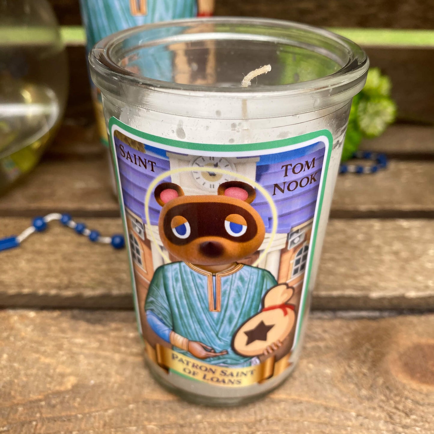 a candle with a picture of a bear on it