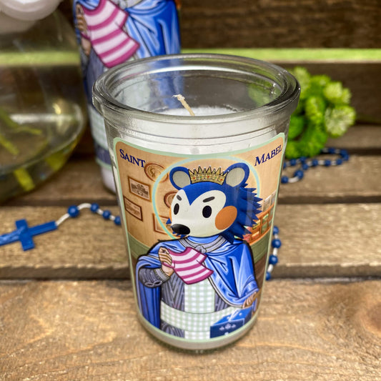 a candle with a picture of a bear on it